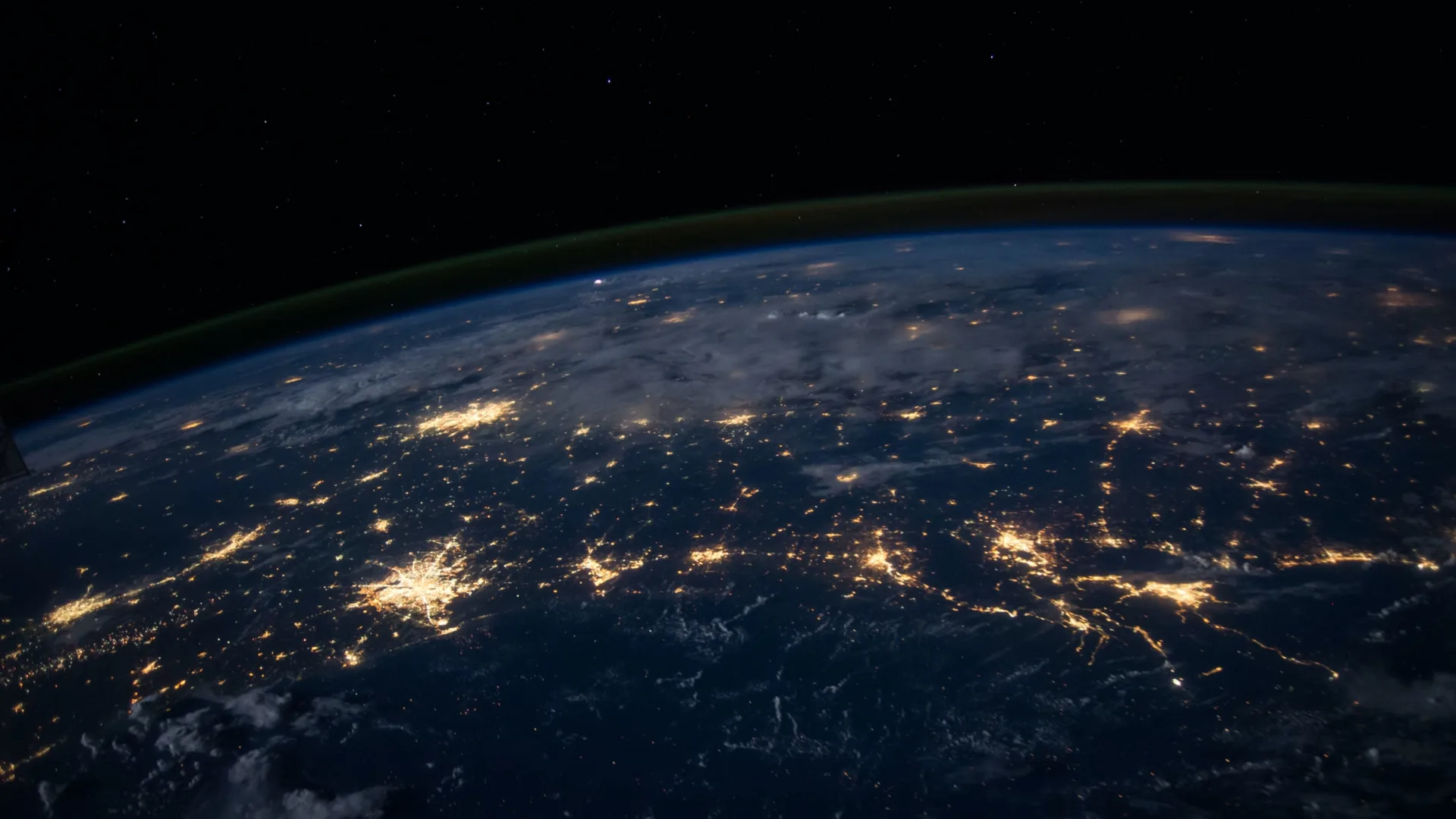 View of earth from space, with major cities showing light pollution
